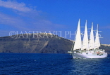 Greek Islands, SANTORINI, Wind Star cruiser passing island, GIS639JPL