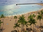 Hawaiian Islands, OAHU, Waikiki Beach, sunbathers and coconut palms, HAW273JPL