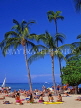 Hawaiian Islands, OAHU, Waikiki Beach, sunbathers and coconut trees, HAW368JPL