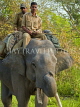 INDIA, Assam, Kaziranga National Park, rangers riding elephant, IND1443JPL
