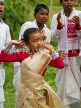 INDIA, Assam, Rongali Bihu Assamese New Year festival, girl dancing, IND1458JPL