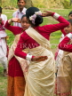 INDIA, Assam, Rongali Bihu Assamese New Year festival, girls dancing, IND1460JPL