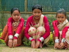 INDIA, Assam, Rongali Bihu Assamese New Year festival, girls resting from dancing, IND1461JPL