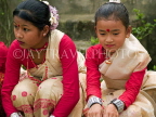 INDIA, Assam, Rongali Bihu Assamese New Year festival, young dancers resting, IND1465JPL