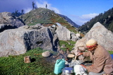 INDIA, Himachal Pradesh, Himalayas, shepherd cooking Chapatis, IND1234JPL