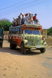INDIA, Rajasthan, JAISALMER, crowded bus with passengers on roof, IND619JPL