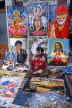 INDIA, South India, MADRAS, street vendor selling posters (deities and pop stars), IND949JPL