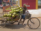 INDIA, West Bengal, Calcutta, coconuts hauled by rickshaw, IND1375JPL
