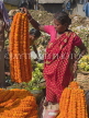 INDIA, West Bengal, Calcutta, showing off marigolds, flower market at Malik Ghat, IND1404JPL