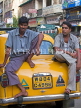 INDIA, West Bengal, Calcutta, taxi drivers sitting on their Ambassadors, IND1405JPL