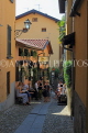 ITALY, Lombardy, Lake Como, BELLAGIO, narrow street and restaurant, ITL2190JPL