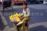 India, DELHI, fruit stall and boy vendor, IND790JPL