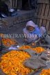 India, DELHI, vendor making flower garlands (for temple offerings), IND954JPL