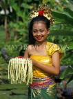 Indonesia, BALI, Balinese classical dancer with flower offerings, BAL533JPL