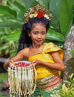 Indonesia, BALI, Balinese dancer, holding bowl of floral offerings, BAL537JPL