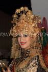 Indonesia, SUMATRA, cultural dancer in elaborate costume, headgear, INDS1282JPL