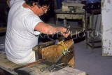 Italy, VENICE, Murano Island, Murano Glass maker working on horse figurine, ITL1842JPL