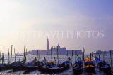 Italy, VENICE, St Mark's Sq waterfront, Gondolas and San Giorgio Maggiore Church, dusk, ITL1815JPL