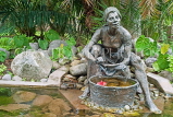 JAMAICA, Kingston, Hope Gardens, statue of woman washing clothes, JM392JPL