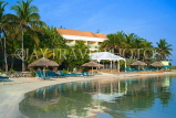 JAMAICA, Montego Bay, Coyaba Beach Resort, sunbeds sunshades on beach, JM369JPL