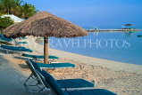 JAMAICA, Montego Bay, Coyaba Beach Resort, sunbeds sunshades on beach, JM370JPL