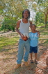 JAMAICA, Montego Bay, Jamaican father and son, posing, JM371JPL