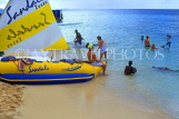 JAMAICA, Montego Bay, beach with holidaymakers and sailboat, JM155JPL