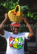 JAMAICA, Montego Bay, fruit seller, posing, JM169JPL