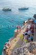 JAMAICA, Negril, Rick's Cafe, tourists at bar area and pleasure boats, JM400JPL