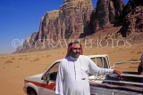 JORDAN, Wadi Rum, Bedouin driver with four wheel truck, JOR127JPL