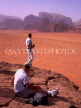 JORDAN, Wadi Rum, tourists and arid landscape, JOR68JPL