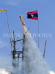 LAOS, Ban Bung Fai Rocket Festival, a bamboo rocket launches into the sky, LAO91JPL