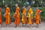 LAOS, Luang Prabang, Buddhist monks collectiong alms, LAO141JPL