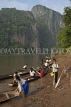 LAOS, Luang Prabang, Mekong River, children preparing to go to school by boat, LAO136JPL