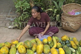 LAOS, Luang Prabang, Mekong River, market scene, vendor selling papaya fruit, LAO127JPL