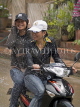LAOS, Luang Prabang, Songkran Water Festival, bikers get sprayed, LAO97JPL