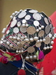 LAOS, Muang Singh, closeup of an Akha headdress, with old french coins, LAO49JPL