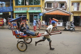MADAGASCAR, Antisirabe, pousse pousse (rickshaw) and driver, MDG217JPL
