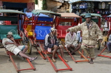 MADAGASCAR, Antisirabe, pousse pousse (rickshaw) and drivers, MDG220JPL