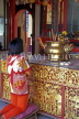 MALAYSIA, Penang, Kek Lok Si temple, worshipper at a shrine, MSA667JPL