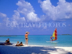 MALDIVE ISLANDS, tourists on beach and windsurfer, MAL697JPL