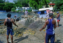 MAURITIUS, Ile Aux Cerfs coast, fishermen sorting out nets, MRU327JPL