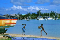 MAURITIUS, North Coast, Grand Bay, children playing on beach, MRU186JPL