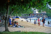 MAURITIUS, North Coast, Grand Bay, locals on public beach, MRU208JPL