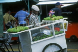 MAURITIUS, Quatre Bornes Market, fruit seller (custard apple), MRU250JPL