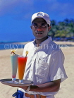 MAURITIUS, beach near Le Saint Geran Hotel, waiter with cocktails, MRU135JPLA