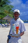 MAURITIUS, beach near Le Saint Geran Hotel, waiter with cocktails, MRU348JPL