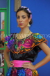 MEXICO, Chiapas, Chiapaneco woman in traditional dance costume, MEX710JPL