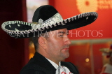 MEXICO, Mexico City, Mariachi (portrait) wearing a sombrero, MEX722JPL
