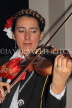 MEXICO, Mexico City, Mariachi playing violin, MEX763JPL